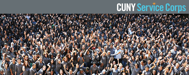 A large crowd of people posing for the camera. The top of the image reads: CUNY Service Corps.