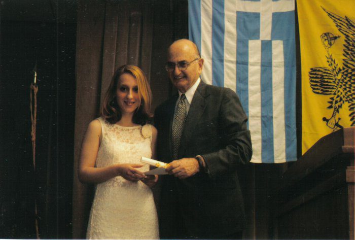 Professor Psomiades (Founder) presents an award to Georgia Belesis.