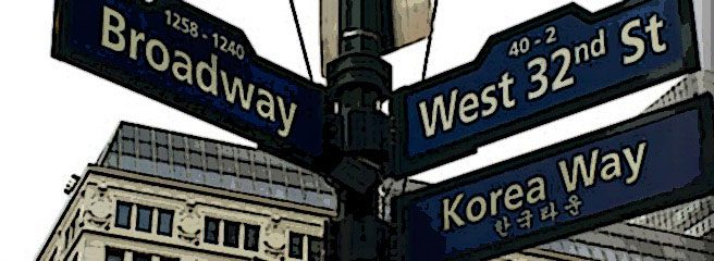 Signpost with three directions. Broadway 1258-1240, 40-2 West 32nd St, Korea Way.