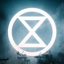 Extinction Rebellion – The artwork resembles a vector hourglass in a circle.