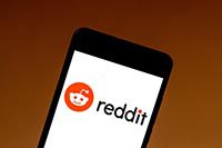 Reddit logo on a smartphone.