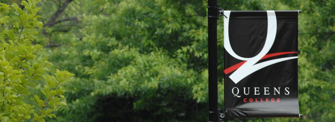 Queens College banner outdoors.