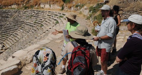 Queens College students survey the ancient theater at Aphrodisias, Turkey.