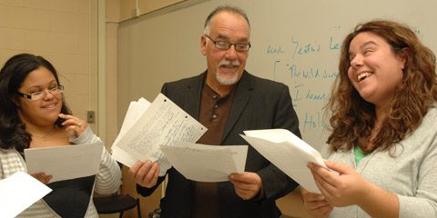 Professor Gardaphe and his students share a laugh in his course "Funniest Fiction."