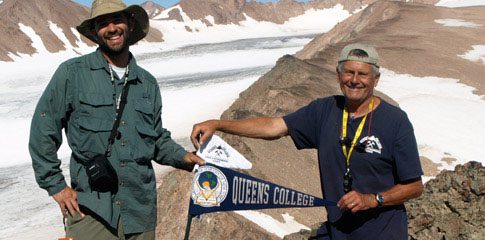 Student Richard Bubbico and geology Professor Hannes Brueckner claim their Greenland research site for Queens College.
