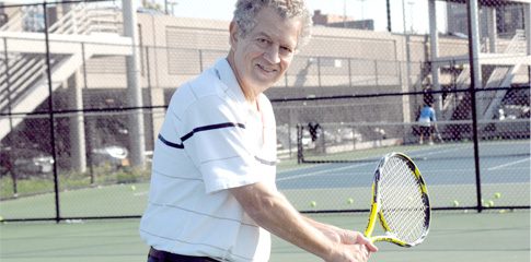 Robert Bittman playing Tennis.
