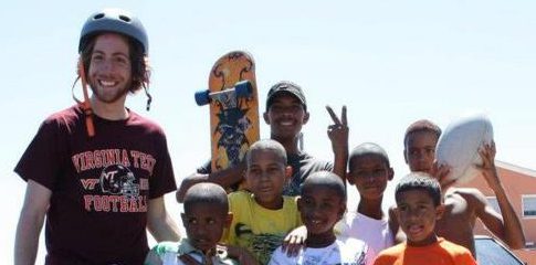 Mike Strianese and the children of Mitchells Plain, South Africa, bond over their shared love of skateboarding during Strianese’s January 2012 study abroad trip.