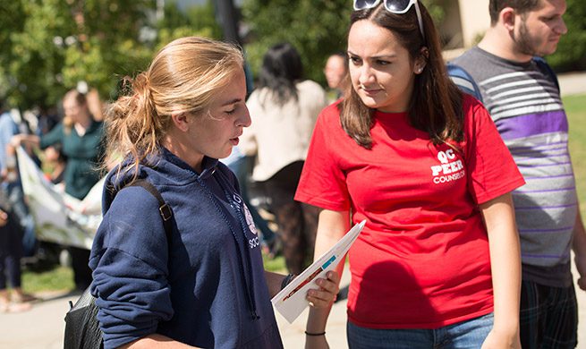 Two students having a discussion.