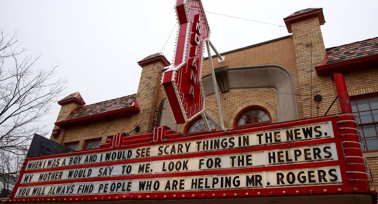 A quote attributed to Mr. Rogers fills the marquee above the Indiana Theater in Bloomington, Indiana, on March 18. Barcroft Media / Getty Images The quote reads: When I was a boy and I would see scary things in the news, my mother would say to me, look for the helpers you will always find people who are helping Mr. Rogers