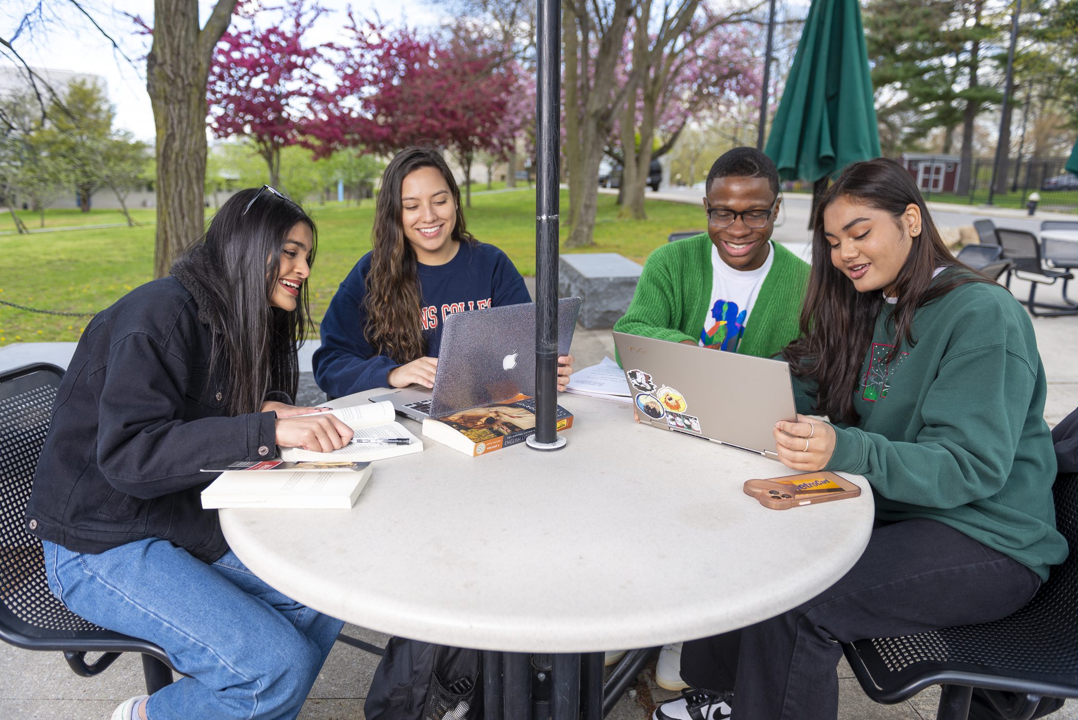 Students studying and hanging out on campus.