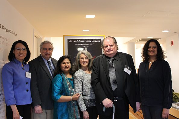 Six people standing side-by-side.