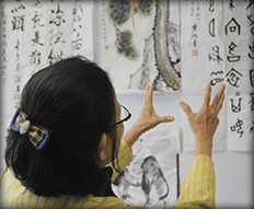 A person looking at writing.