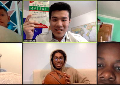 A video call of six people holding up items during a Scavenger Hunt.