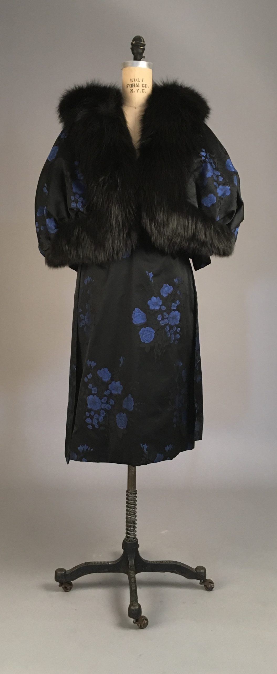 12 50s FUR ENSEMBLE 1950s emsemble; a deep blue silk brocade dress with a matching fur coat.