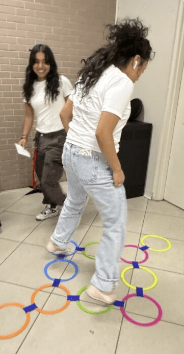 Bella laughing at Allison Hopscotch