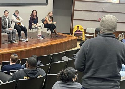 A student engages our faculty panel on the first 50 days of the second Trump administration.