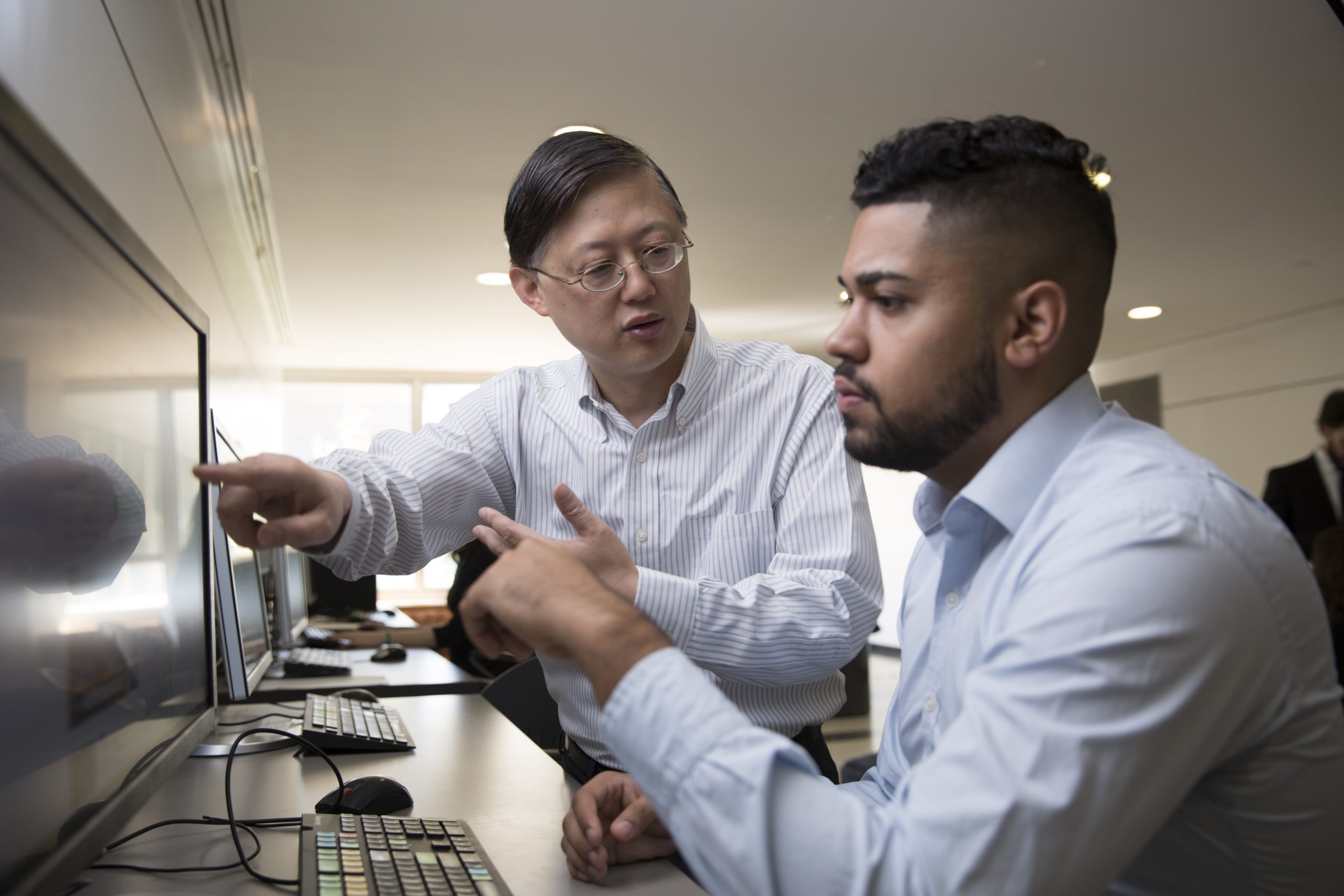 Queens College students receiving professional guidance