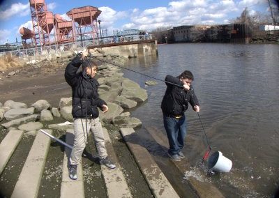 Tossing the sample bucket for water analysis on the Bronx River