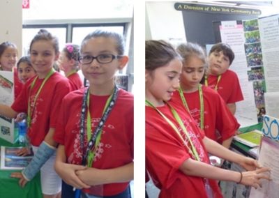 Two photos of elementary school students standing around crayfish and soils project posters.