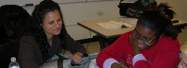 Two people sitting at a table.