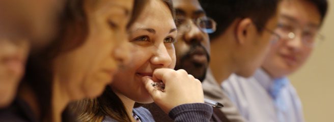 A close-up of people sitting together.