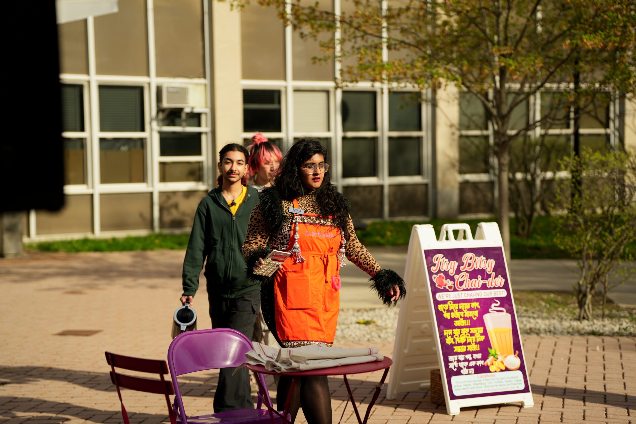 Three performers during the interactive play Flood Sensor Aunty for Earth Day 2025.