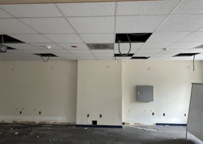 Wall and ceiling renovations in progress.
