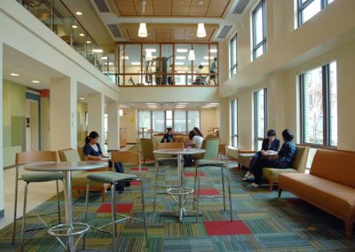 Students sitting in a shared space at The Summit.