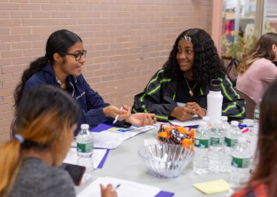 People sitting together at a table.